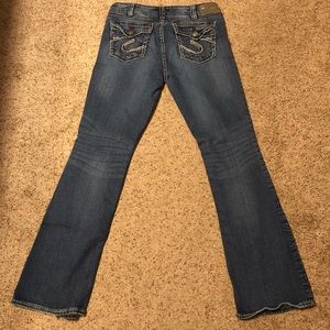 Silver Suki Midrise bootcut jeans. Size 32x34